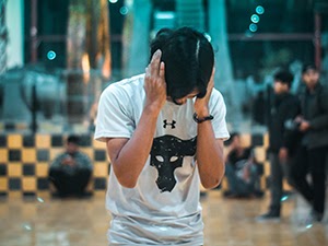Person covering their ears