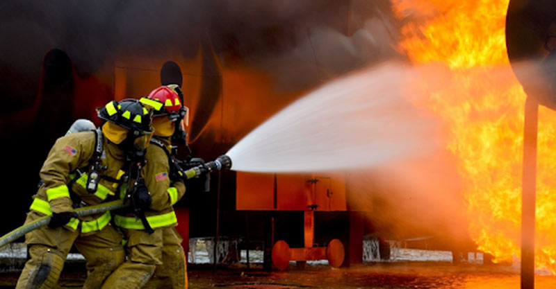 Firemen putting out fire